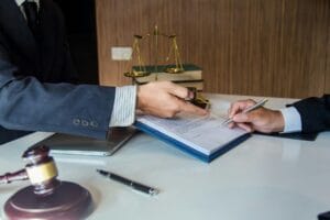 Phoenix lawyer with client discussing statute of limitations